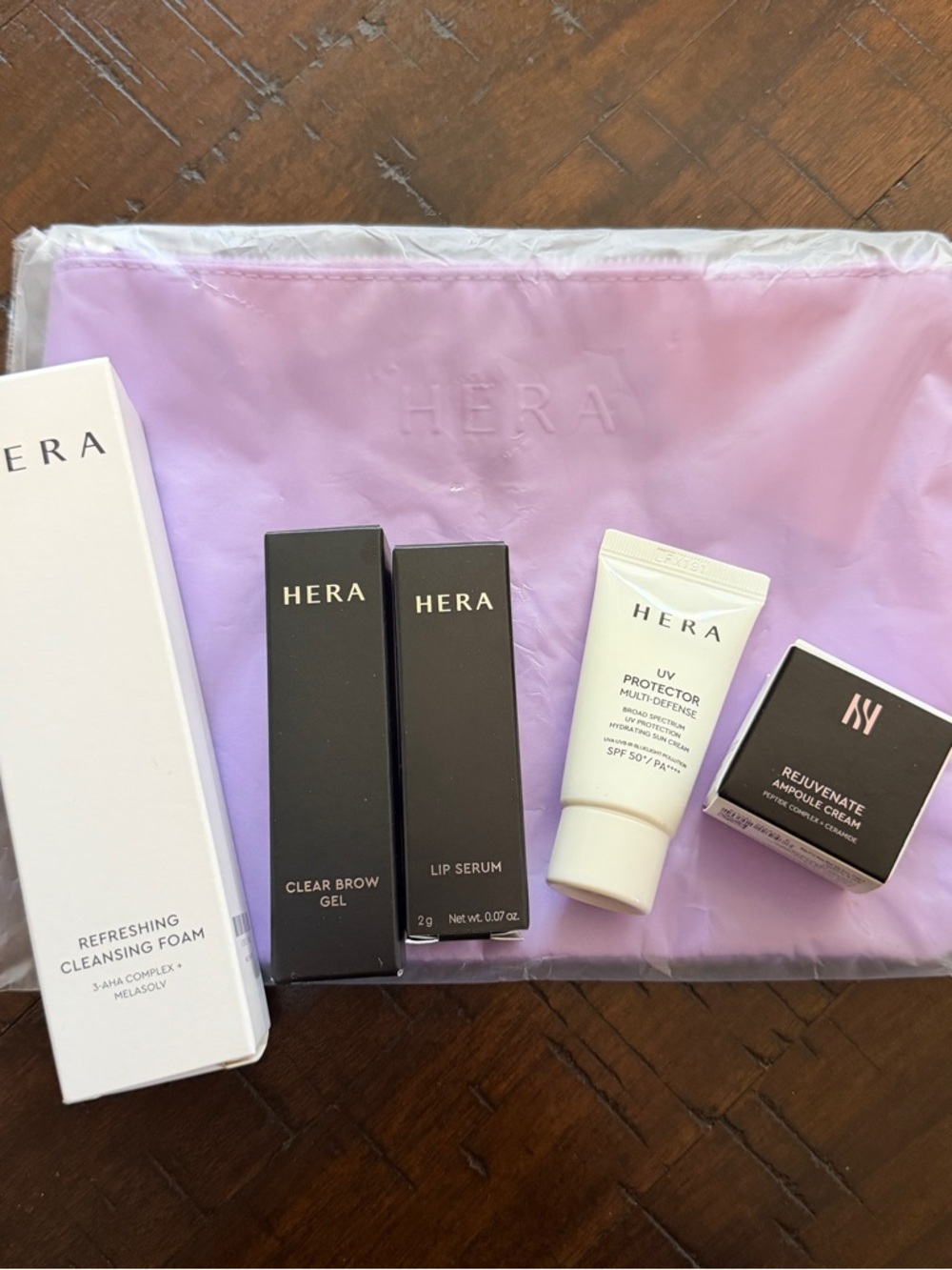 HERA Travel Size Skincare Bundle with Pouch